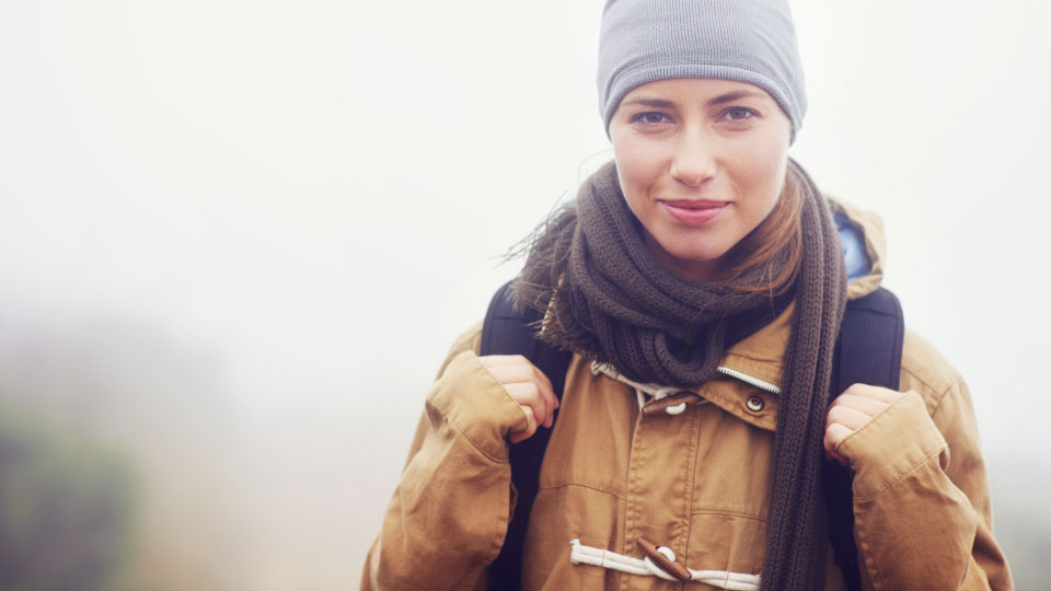 Woman hiking in the snow