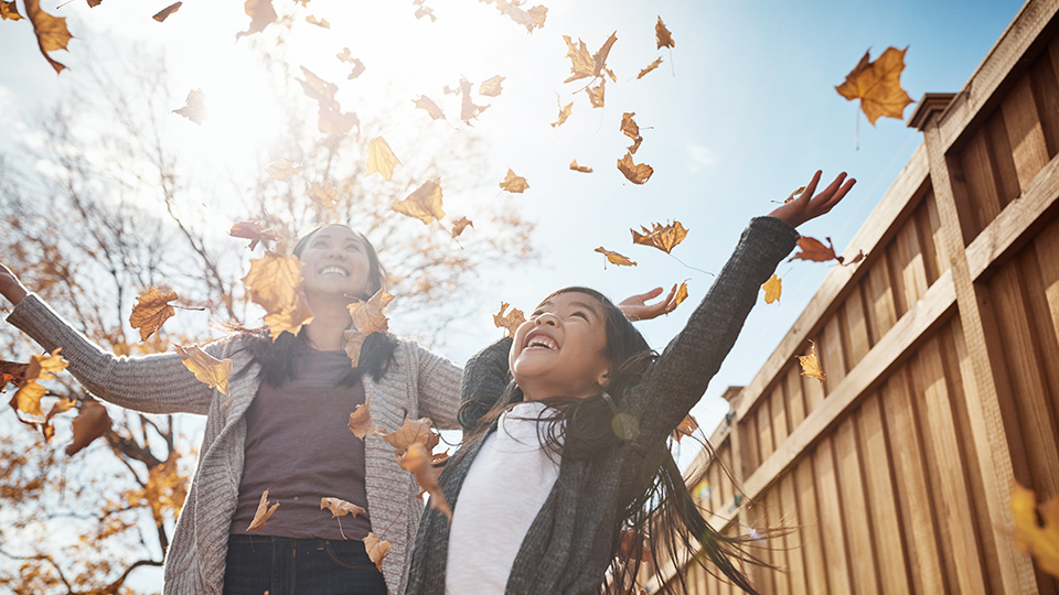 mom daughter fall leaves