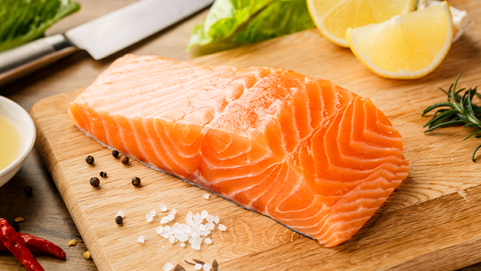 Fresh fish on a wooden cutting board