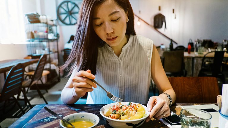 A woman enjoying a healthy meal