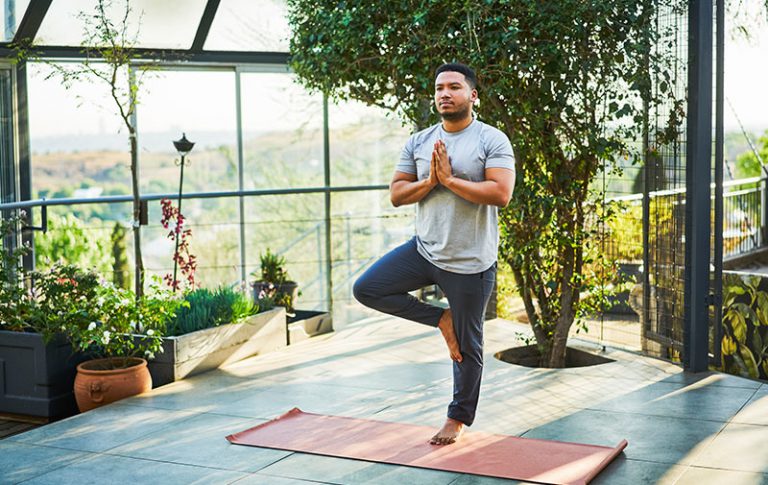 Man stretching outside