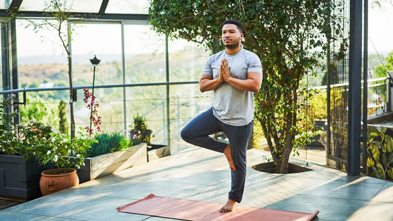 Man stretching outside