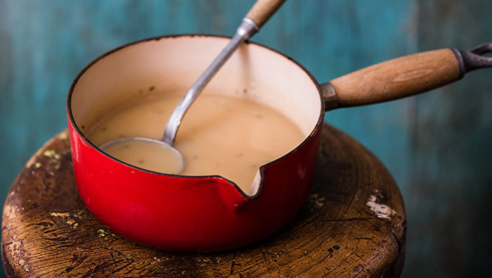 Saucepan with bone broth chicken gravy