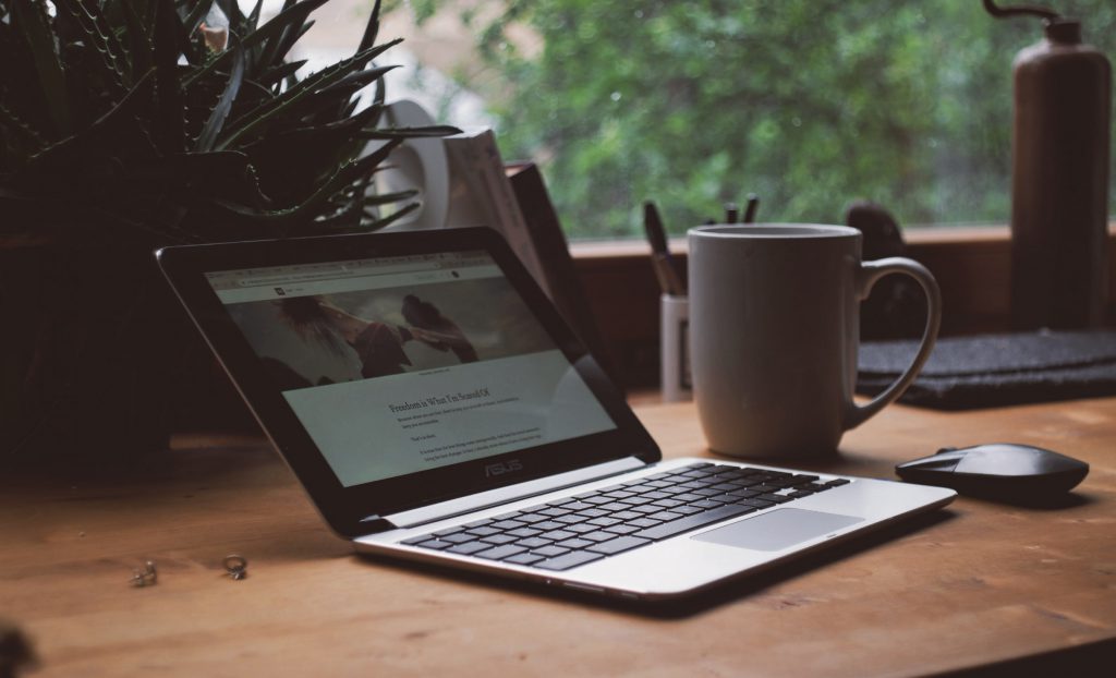 computer with mug