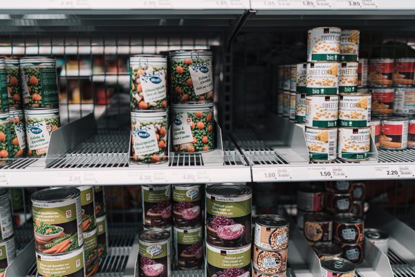 Canned goods on a metal shelf