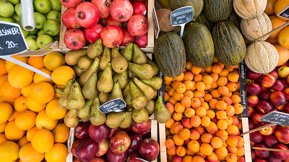 Fresh produce in grocery store bins