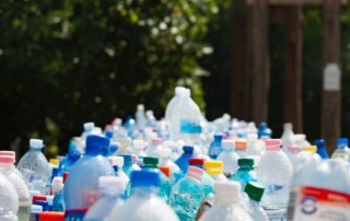 Plastics-Green_Bottles in foreground