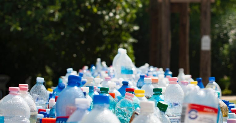 Plastics-Green_Bottles in foreground